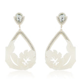 Off-white statement earrings featuring intricate ornate-link leaves